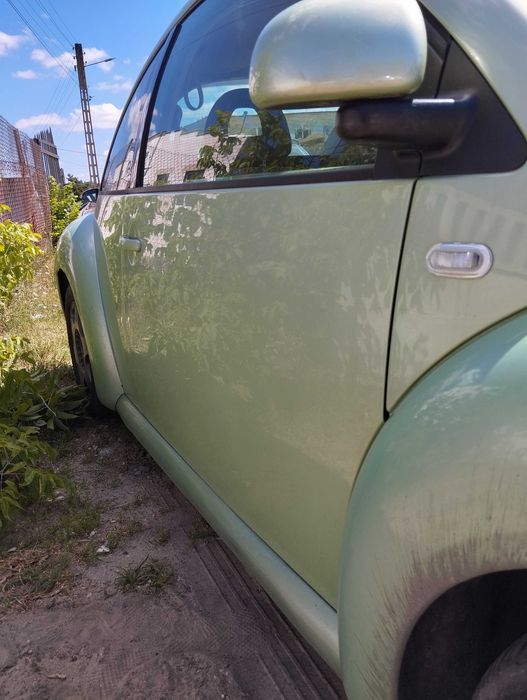 Volkswagen New Beetle 1.9TDI 2000r.Drzwi przednie prawe.