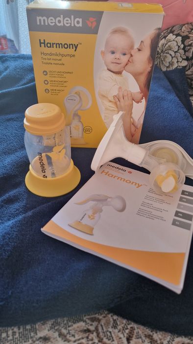 Продам молокоотсос ,пакеты для молока