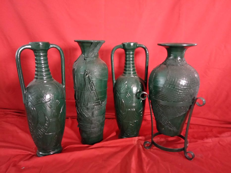Conjunto de 4 potes em barro decorativos