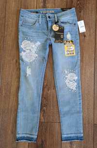 Vigoss śliczne spodnie jeansowe z USA dziury kwiaty 152