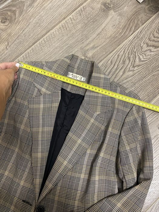 Костюм брючний в клітинку