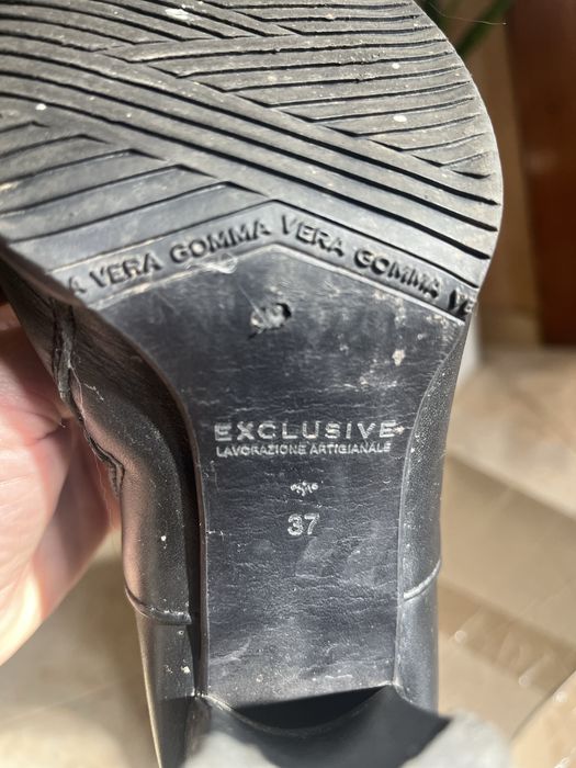 Шкіряні чоботи на каблуку