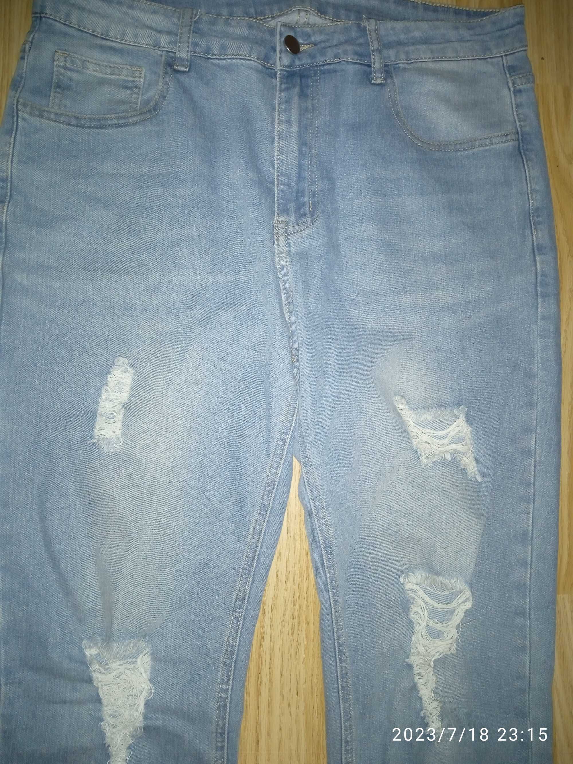 Spodnie męskie, jasne jeansy z dziurami firmy Shein rozmiar M, stan bd