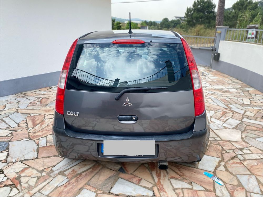 Mitsubishi colt 55cv , 209195 km.