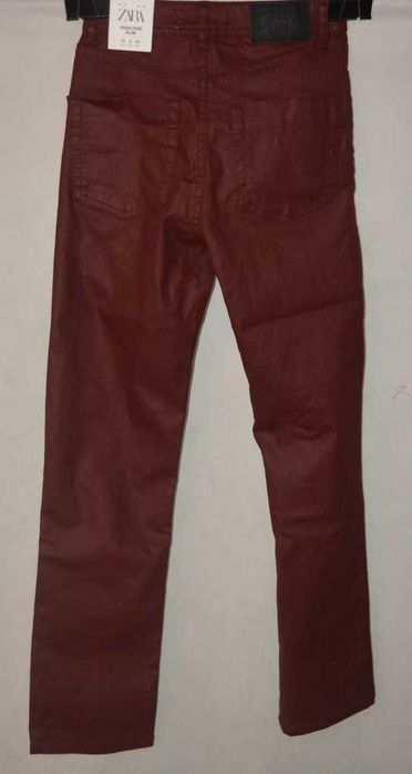 Woskowane jeansy Zara 34