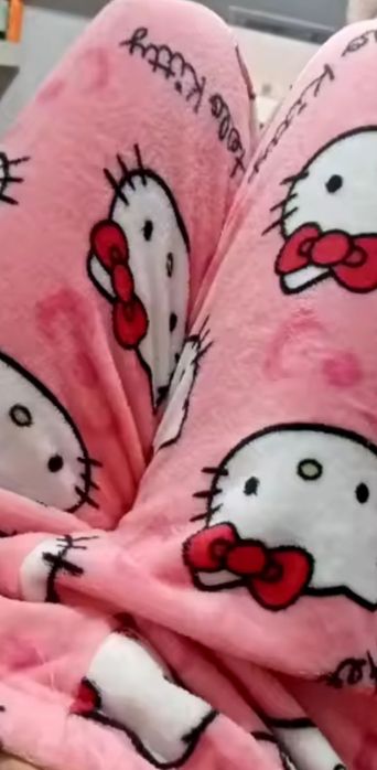 Nowe spodnie piżamowe z printem all over Hello Kitty S/M