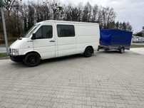 Usługi transportowe z busem i przyczepą.