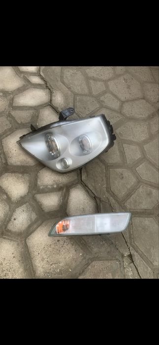 Фара ліва та поворотнік Санйонг Рекстон 2.7. 2004року