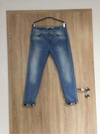 Spodnie dżinsy damskie rozmiar 42 (XL)