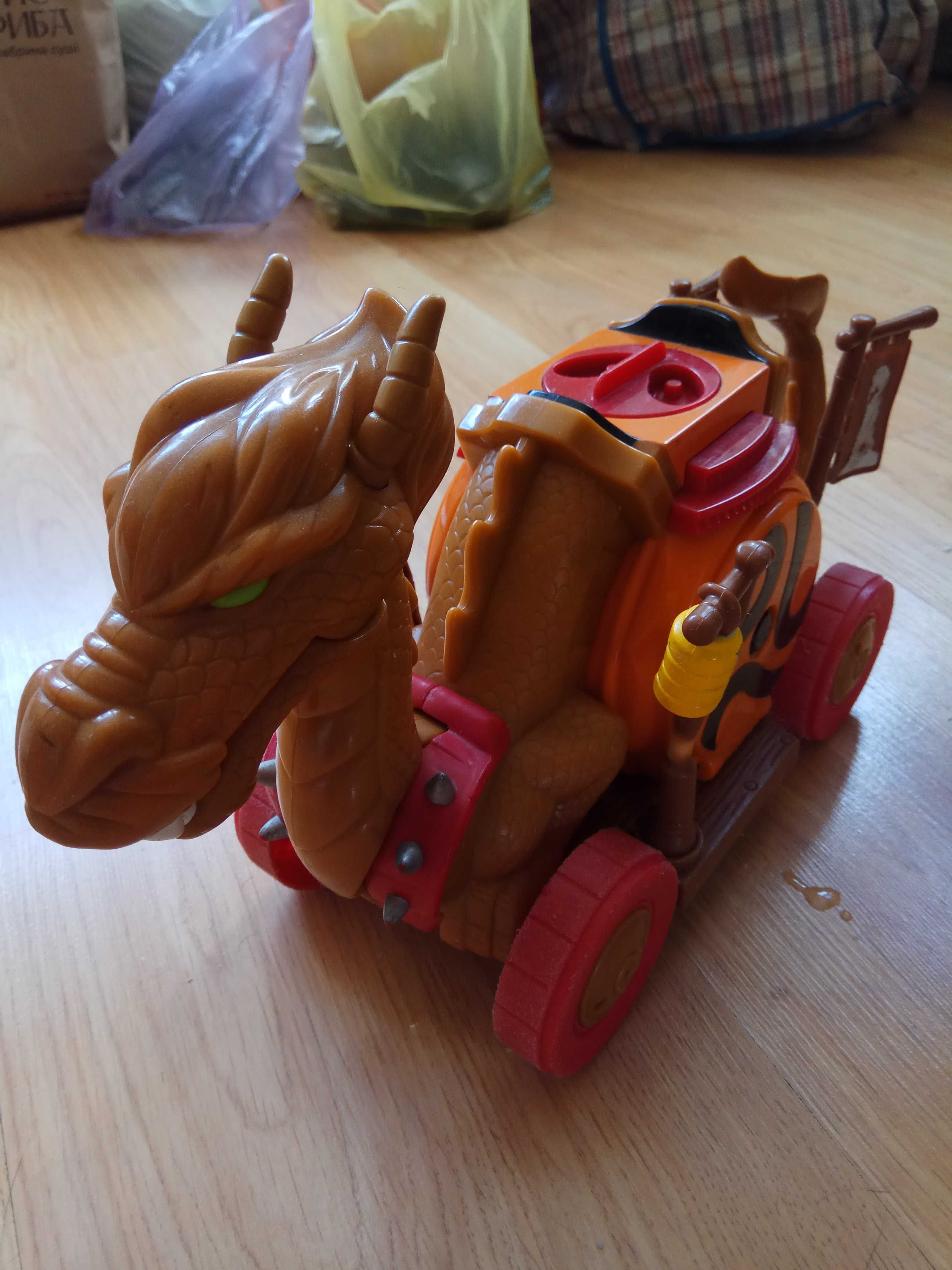Китайський самурай-дракон на колесах Fisher Price