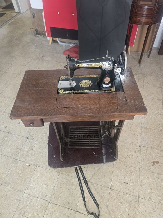 Máquina  de costura  singer