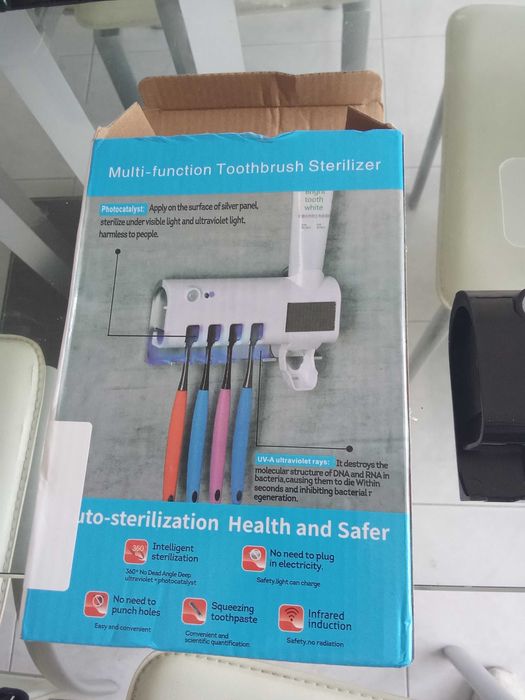 Suporte de parede novo embalado para pasta e escovas de dentes com luz