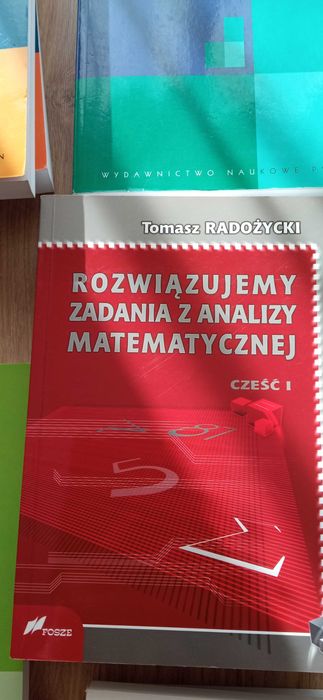 Rozwiązujemy zadania z analizy matematycznej część 1 - T. Radożycki