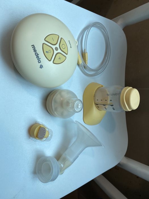 Maquina eletrica extrair leite mamario