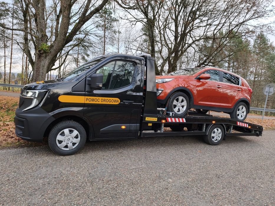 Autolaweta*Przewóz samochodów,osób,sprzętu rolniczego i inne.