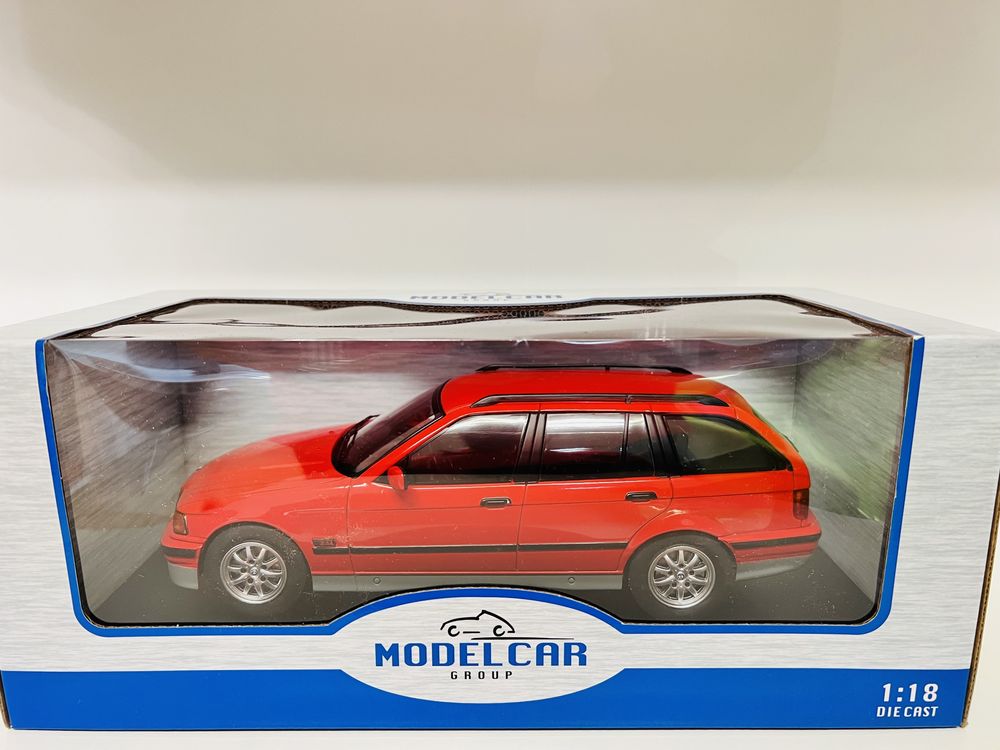 BMW 320i Touring E36 czerwony MCG 1/18