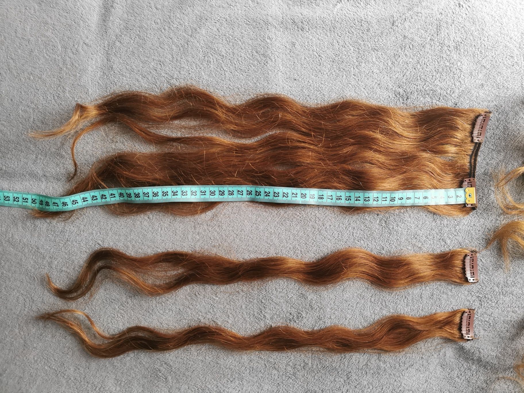 Naturalne włosy do doczepienia o długości 50 cm