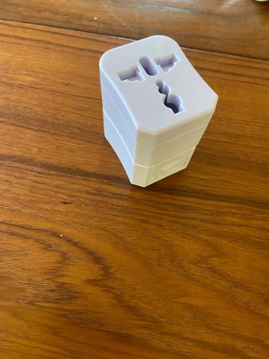 Adaptador de tomada para EUR / USA / UK