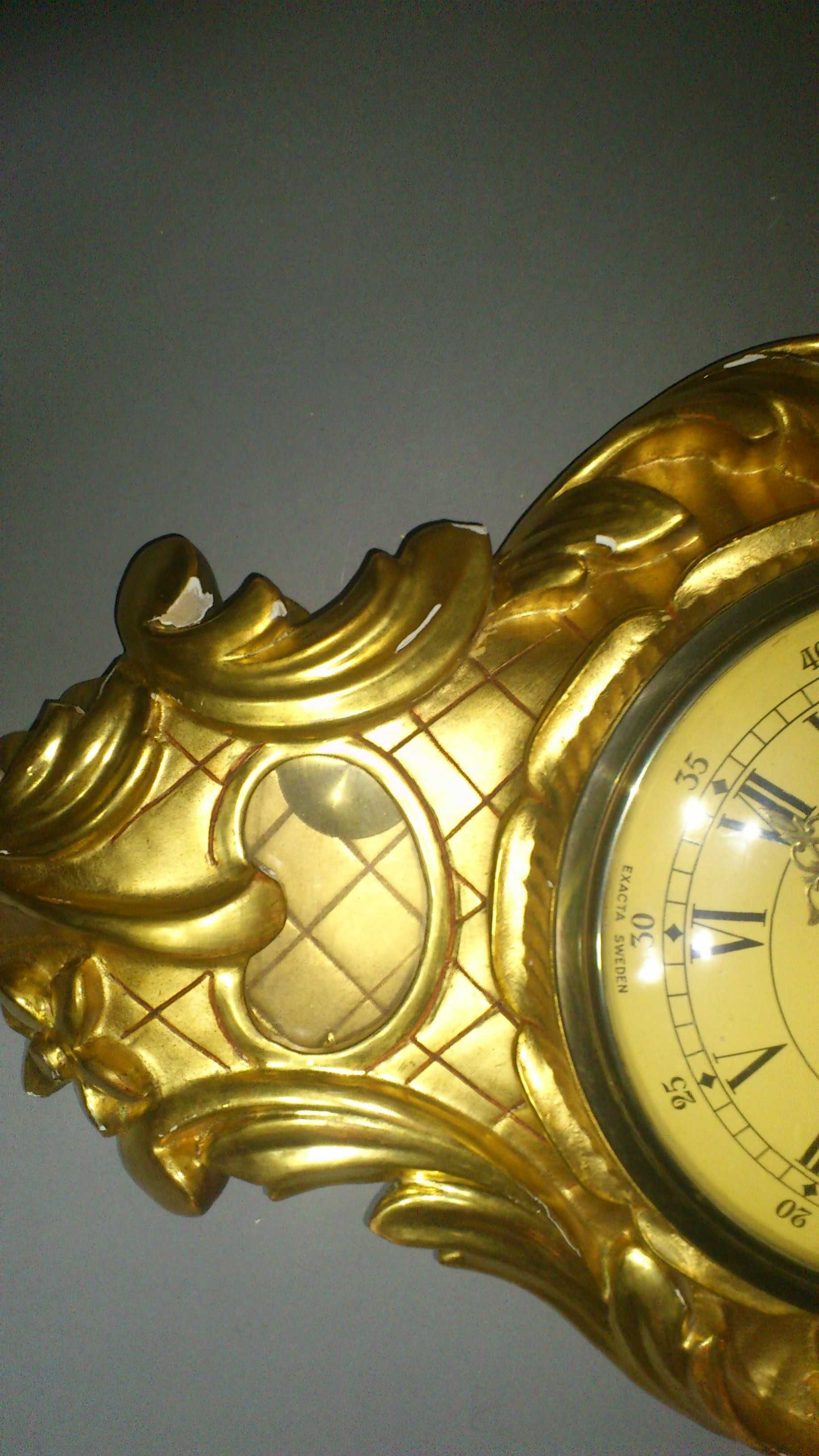 Szwedzki złocony zegar ścienny  Exacta Hasselbad