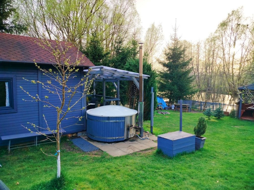 Domek na Kaszubach z gorącą balia jacuzzi ,stawem ,