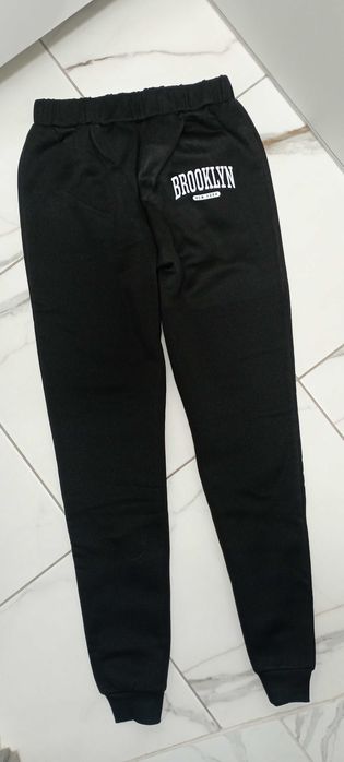 Нові теплі спортивні штани на зріст 160 см