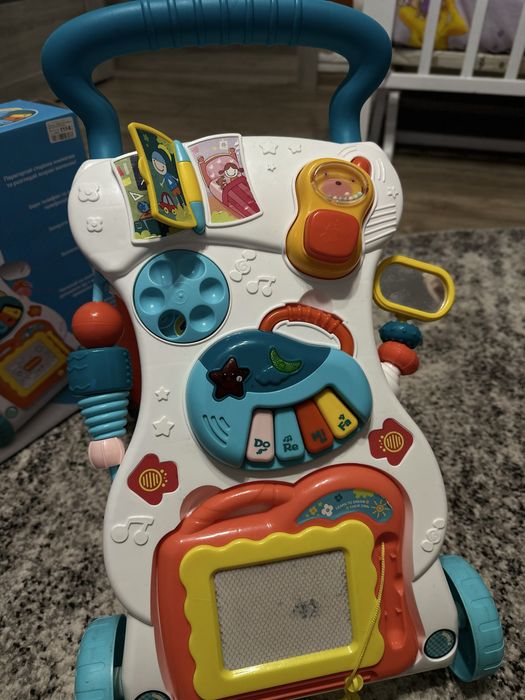 Ходунки каталка з ігровим центром