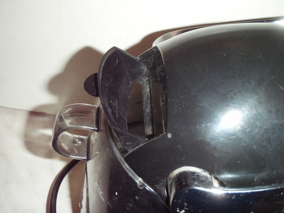 Ekspres Tchibo na kapsułki Cafissimo - czarny , sprawny, kompletny