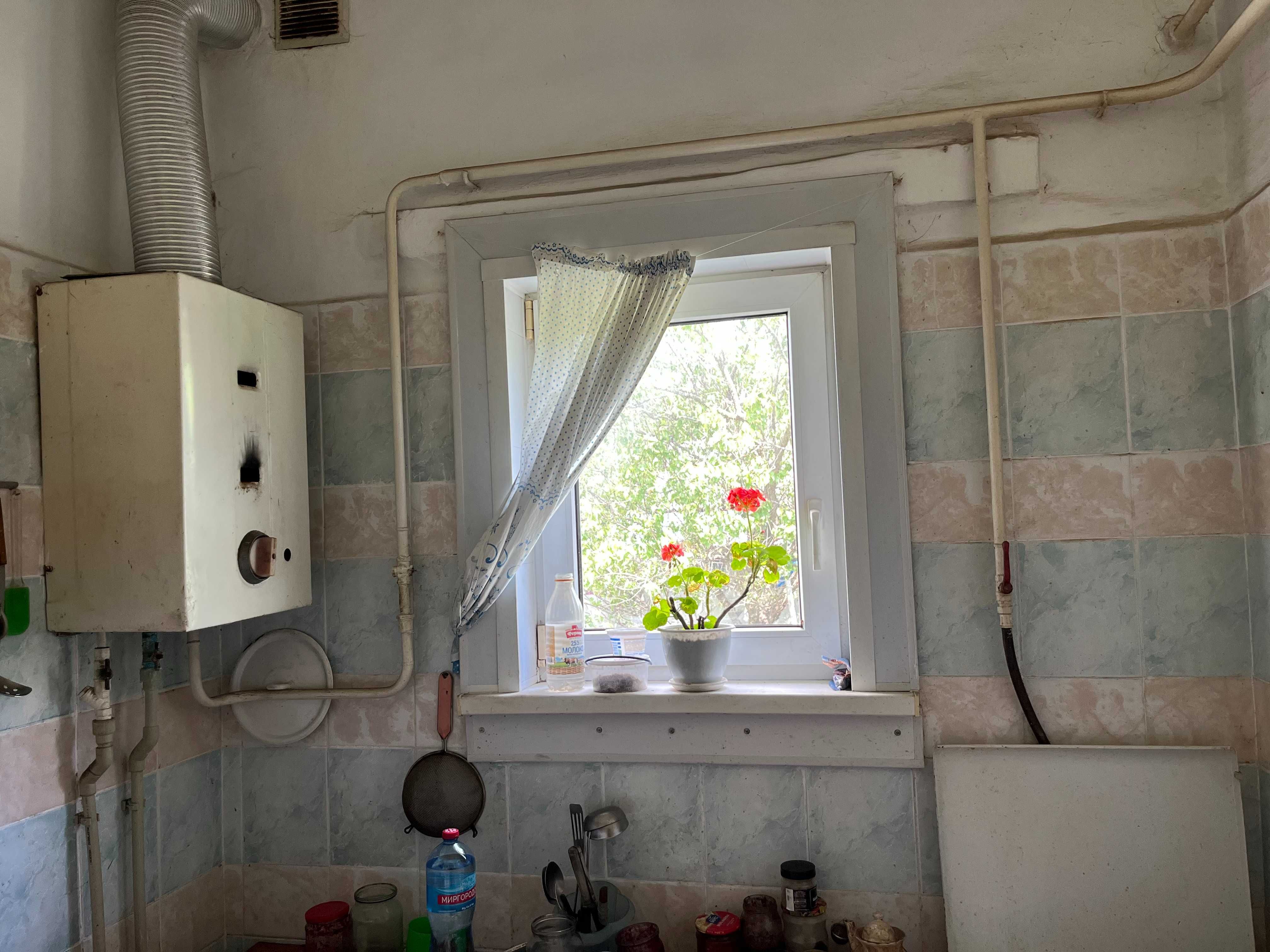 Продам півбудинку,р-н"Порт",вул.Успенсько-Троїцька