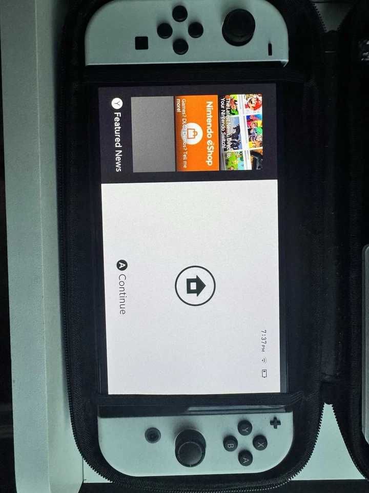 Nintendo Switch OLED 64GB + Etui podróżne