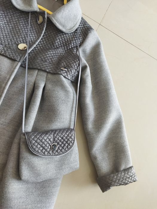 Cudny płaszczyk rozm. 122 jak nowy