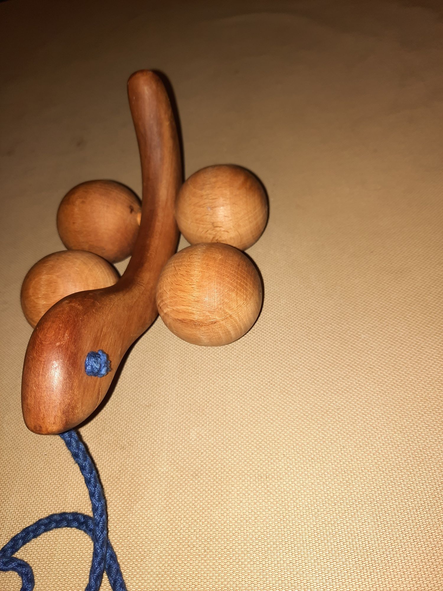 Деревянная игрушка каталка