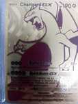 Carta Pokemone charizard.