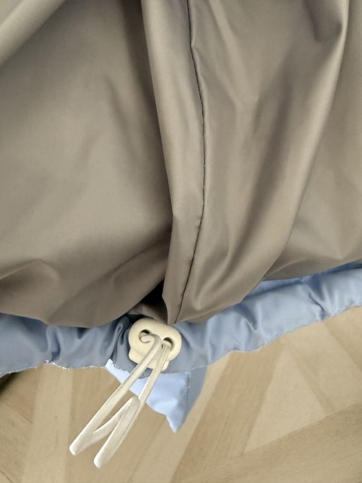 Жіночий пуховик розмір М