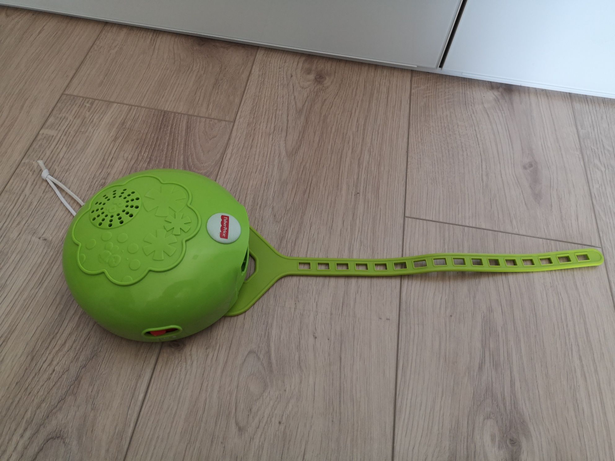 Uspakajacz, szumiś do łóżeczka Fisher Price, zielony. Melodyjki