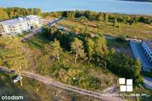 Działka z eleganckim sąsiedztwem apartamentowców