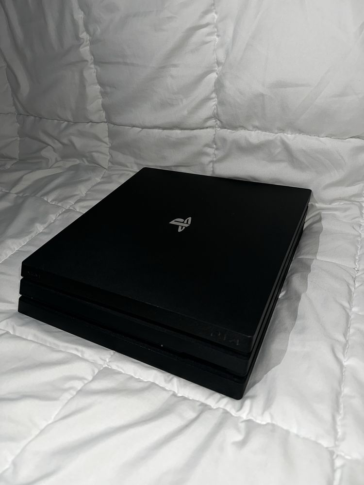 Ps 4 pro 1 tb (2 dualshock)