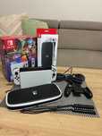 Nintendo switch Oled cały komplet + oryginalne etui i 2 gry