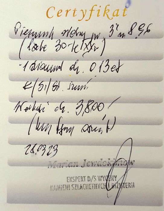 Złoty sygnet próby 3 z diamentem około 0,13 ct z lat 1920 / 31