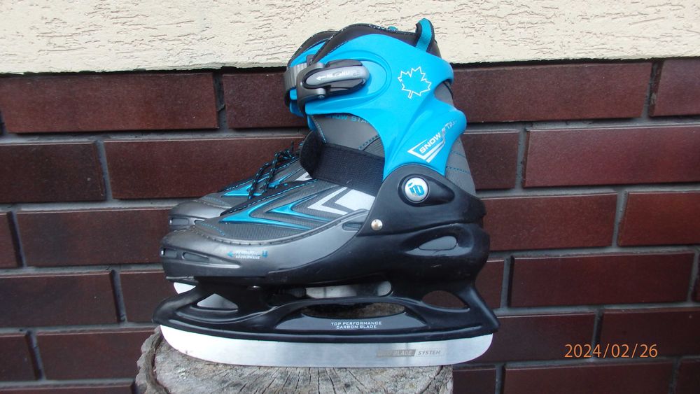 Buty zimowe z łyżwami regulowane od 34 do 37.