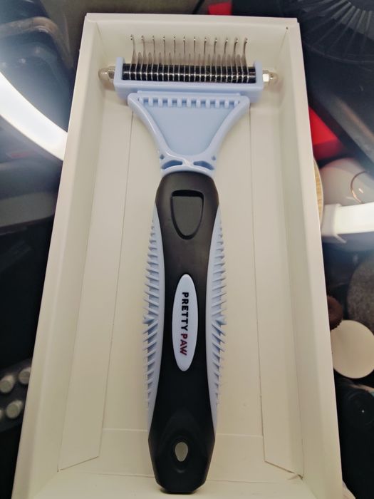 Щітка для шерсті тварин