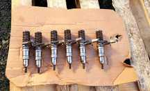 Wtryskiwacz wtrysk CAT G950 dysza wtrysku 127821 kompl 6szt