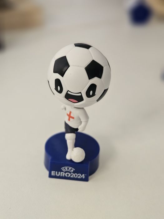 Jogadores com cabeça de bola europeu