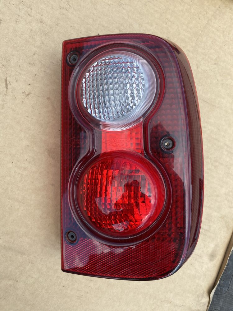 Land Rover Freelander 1 l lift lampa prawa tyl tylna w