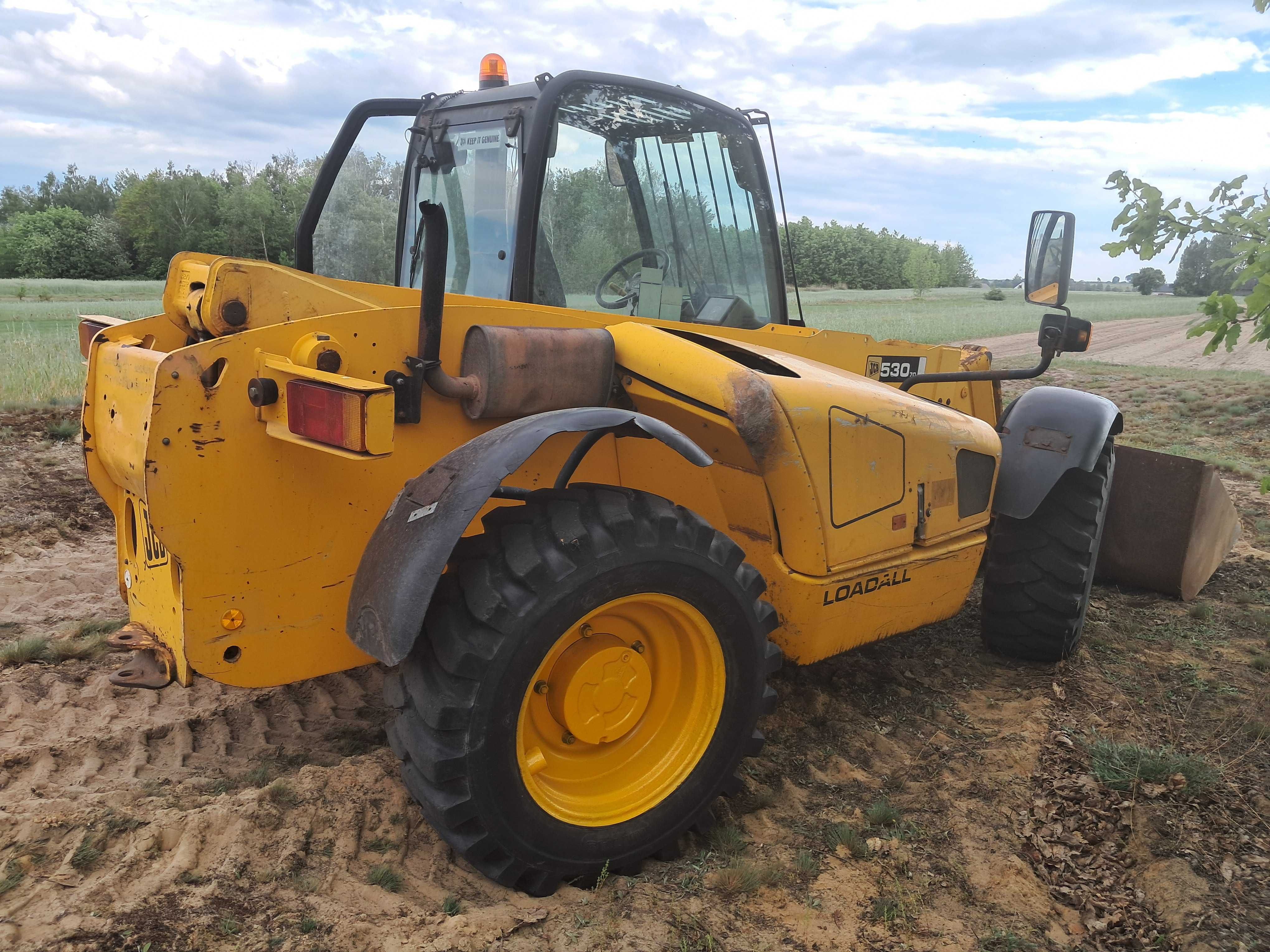 Ładowarka teleskopowa JCB 530-70 sprowadzona 2002 rok manitou merlo