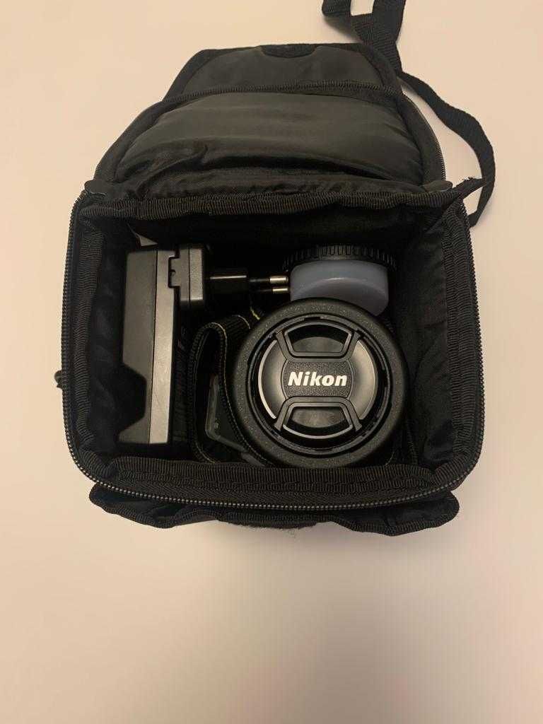 Vendo Nikon D3100 + 2 objetivas + bolsa e cartão