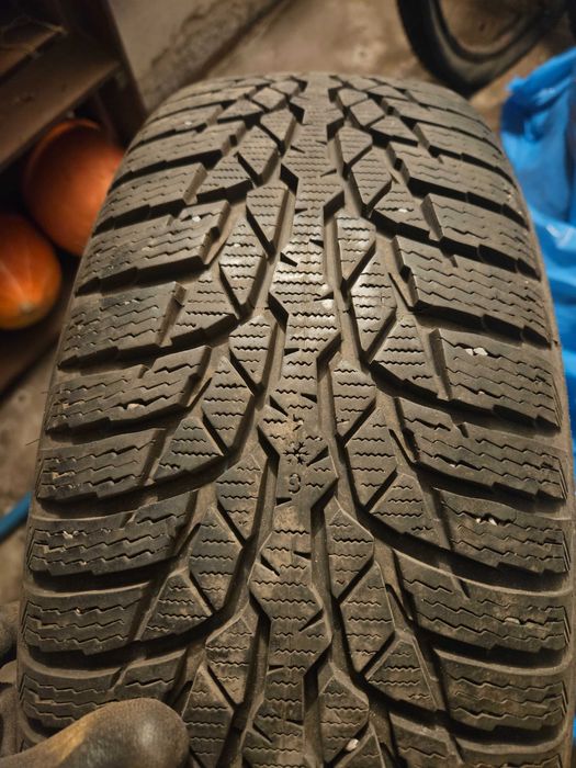 Opony zimowe Nokian WR D4 195/65R15 91T + Felgi stalowe VW 5x112