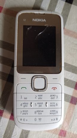 Телефон нокиа рабочий,не заряжается,цена-200 грн.
