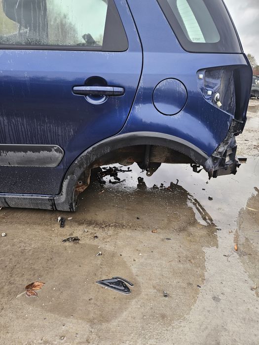 Suzuki sx4 Fiat sedici listwa błotniki lewa lewy tył