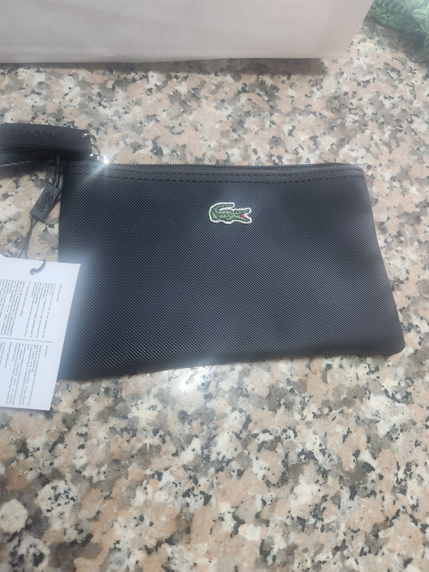 Bolsa lacoste com alça de mão