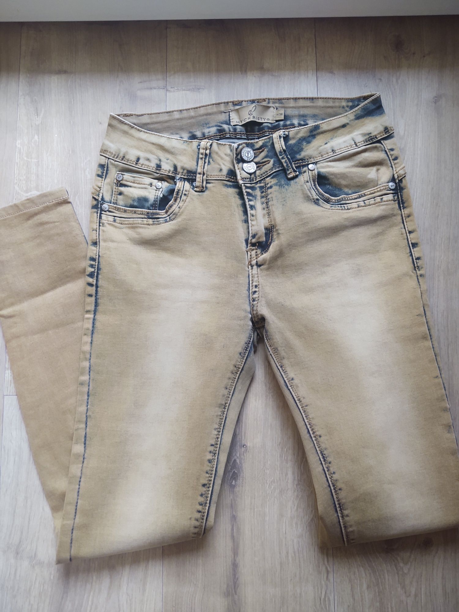 Musztardowe jeansy rozmiar M